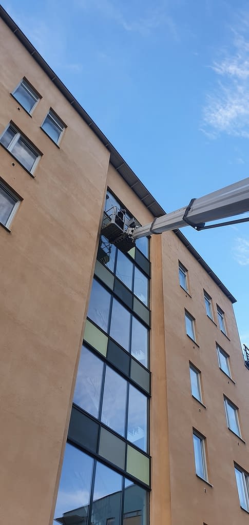 Cleaning High Windows at an Office Tower in Denver