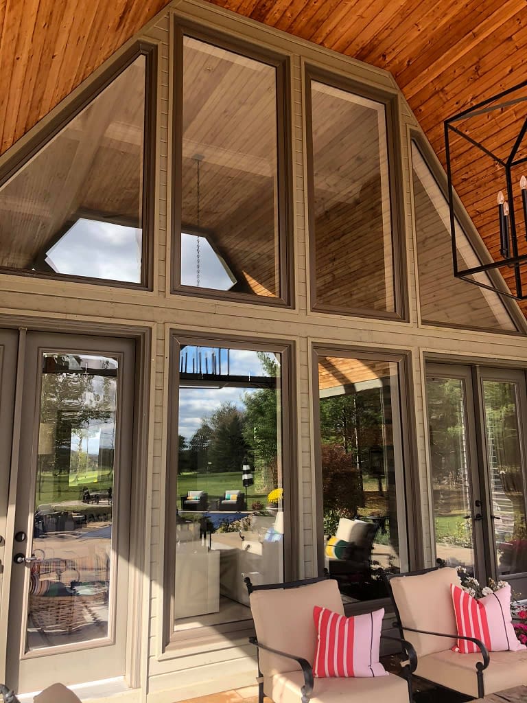 How to clean triangle peak windows at my house